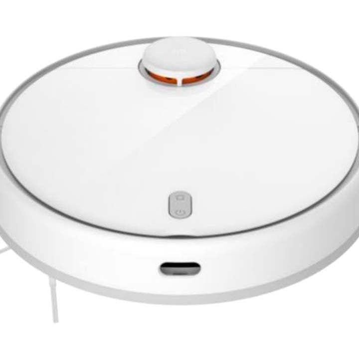 Robotic vacuum cleaner: A small product that is often circular that travels across the floor by itself to vacuum up particles and dirt.